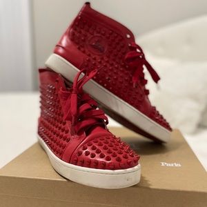 red sneakers with spikes